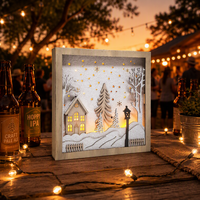 Cadre en bois N-Concept pour boîte à ombres de Noël avec lumière LED, scène de maison hivernale enneigée, décoration de Noël pour table