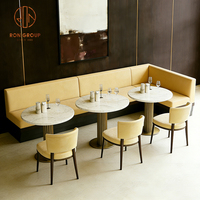 Ensemble de mobilier de café-restaurant en marbre courbé : table, chaises, banquette et canapé