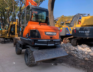 Doosan Dx60W Dx60 Dx80 Dx140 Dx150 Dx210 Doosan Dx140 Pelleteuse sur pneus d'occasion - Product Image 2
