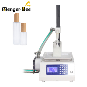 Machine de remplissage liquide verticale semi-automatique électrique pour le miel, le ketchup, le shampoing, l'huile, la pâte avec emballage en cartons - Product Image 2