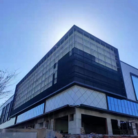 Écran LED transparent en maille extérieure haute luminosité GUOJIA Factory P3.91*7.82 pour la publicité murale extérieure des bâtiments