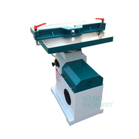 Machine à profiler et à cisailler le bois avec table inclinable et orientable à 45 degrés