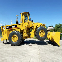 Chargeuse compacte Caterpillar 980F d'occasion, 4x4, capacité 9 tonnes, modèle 2022, avec moteur et boîte de vitesses, pour travaux de terrassement et de remblayage.