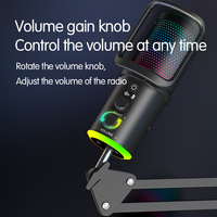Microphone d'ordinateur de type RGB avec un bonnette anti-vent en mousse et compatible avec les smartphones pour l'enregistrement et la diffusion.