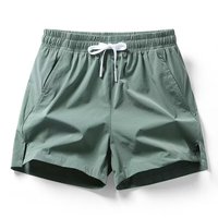 Pantalons de sport et de fitness, shorts décontractés à trois quarts, élastiques, pour hommes, shorts de couple