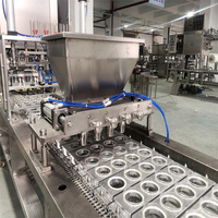 Fabricant de machines automatiques de remplissage et de scellage de couvercles pour yaourts en pot avec céréales, flocons d'avoine et miettes de biscuits