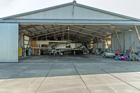 Hangar d'avion industriel neuf de 70 m de large à assemblage rapide, structure en acier à travée libre, grande capacité, sur mesure