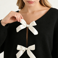 Vêtements pour femmes en gros d'usine : Cardigan élégant en polyester à col en V avec nœud, couleur unie, aspect tricoté en laine, séchage rapide et respirant