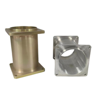Bodies de raccordement en alliage d'aluminium usinés avec précision sur commande CNC, anodisation or et argent disponible.