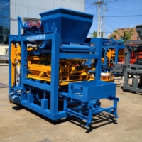 Machine entièrement automatique de fabrication de briques et de blocs en béton QT4-25