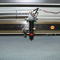 Machine de gravure et de découpe au laser CO2 ActionLasers 6090 pour acrylique et plastique - Haute précision, protection des yeux, refroidissement par eau
