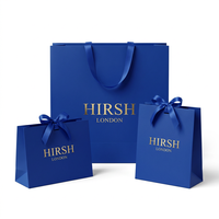Sac cadeau de luxe bleu électrique pour bijoux, sac en papier haut de gamme estampé à chaud avec ruban en satin pour boutique de luxe