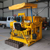 Machine mobile de fabrication de blocs creux en béton avec presse hydraulique pour la production d'œufs de béton, à vendre