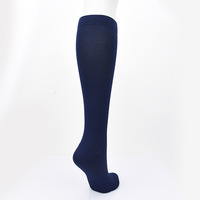 Chaussettes de compression unies mi-hautes, chaussettes de sport élastiques de soutien du mollet pour la course à pied, adaptées aux infirmières