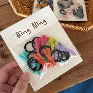 Set di 10 Mini Elastici per Capelli con Fiocco in Filato Colorato, Carini per Codini da Bambina - Product Image 1