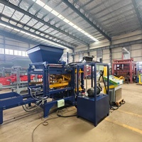 Machine de formage de blocs de béton hydraulique QT4-15B pour usine de briques en ciment