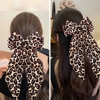 Pince à cheveux en satin léopard pour femmes et filles, barrette à gros nœud avec ruban à longue queue, accessoires pour cheveux de queue de cheval en tissu, vente en gros sur mesure