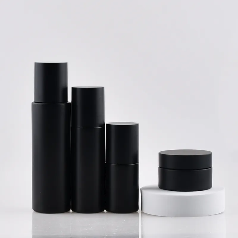Vasetti di vetro verniciato nero con tappo galvanico logo personalizzato e vasetto di crema bottiglia di vetro lozione pompa