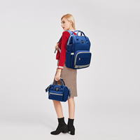 Sac de maman élégant Sac à main multifonction de grande capacité Sac de maternité trois pièces Sac de voyage pour bébé