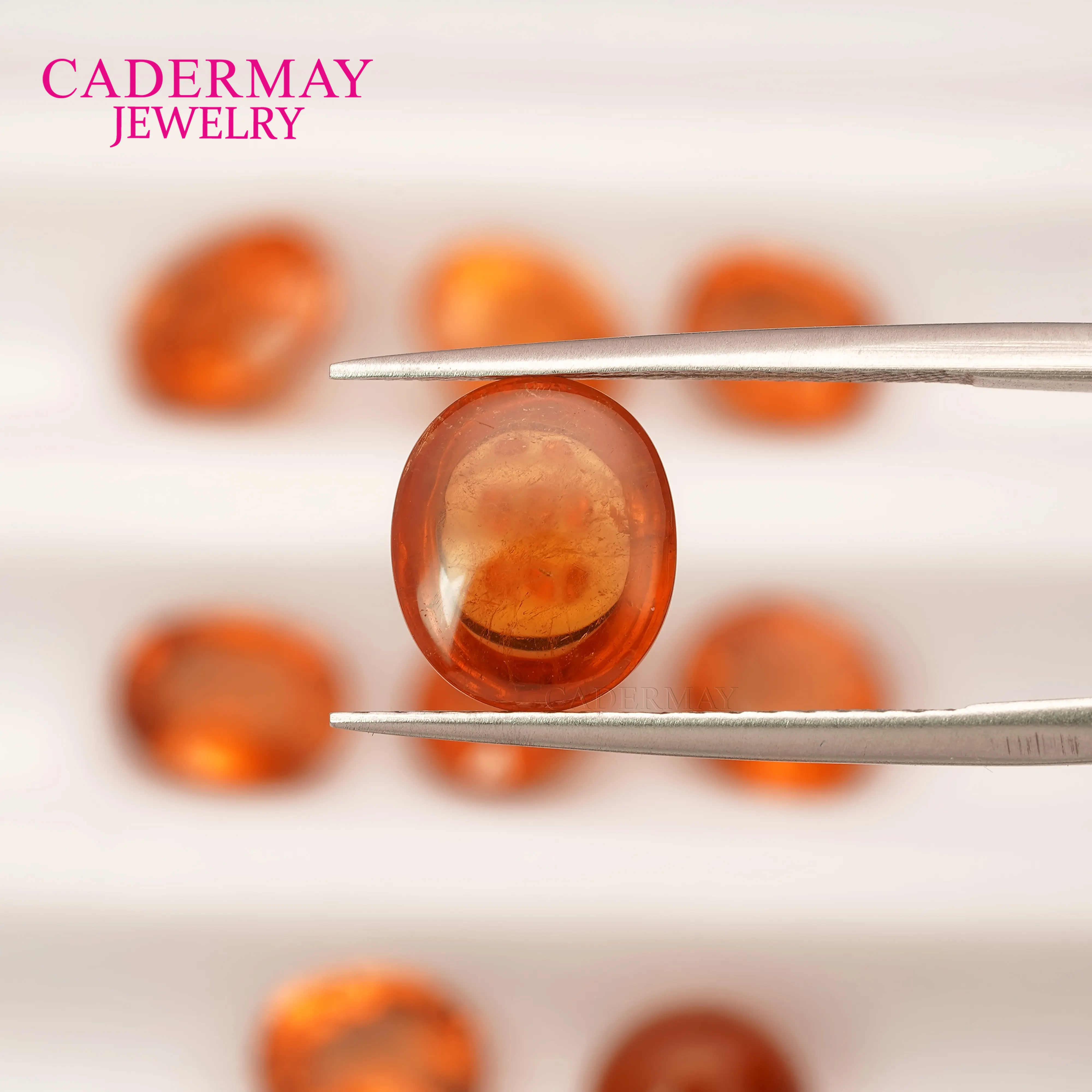 Cadermay อัญมณีธรรมชาติที่ไม่ซ้ําใคร 2ct-3ct รูปไข่สีส้มสดใส Cabochon โกเมนธรรมชาติอัญมณีสเปสซาร์ไทต์ธรรมชาติในสต็อก