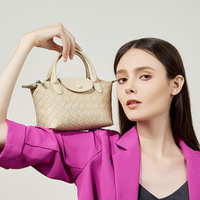 Mini sac en cuir véritable au design unique, nouveau modèle tendance en cuir de vachette tressé, sac à main pour femme style dumpling, pochette pour téléphone portable