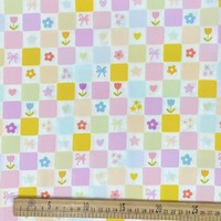 Tissu imprimé numérique en coton pur de haute qualité avec des motifs de fleurs colorées pour les robes et les chemisiers de princesse pour filles