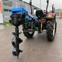 Produit phare : Tarière à engrenages à trois points, montée sur tracteur, pour le creusement de trous de plantation de palmiers, avec palettes en caoutchouc, haute performance