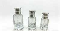 Flacon de parfum en verre rond OEM personnalisé en gros, base volcanique, transparent, or, rouge, vert, blanc, argent, 30 ml, 50 ml, 100 ml, avec boîte