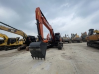 Excavadora Usada DOOSAN DX300 Agile Zero-Tail-Swing para Excavación de Nuevas Líneas de Alcantarillado en Zonas Residenciales Densas
