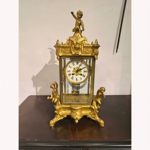 Horloge de cheminée à pendule Mercury, fabriquée en France, avec boîtier en laiton doré 24 carats et figurines de chérubins - Product Image 1