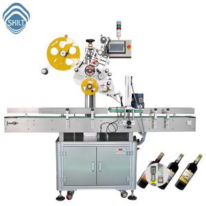 Applicateur d'étiquettes d'excise et machine d'étiquetage de la taxe à valeur ajoutée pour bouteilles de whisky et de vodka - Product Image 1