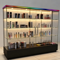 Vitrine pour maquettes de bateaux avec éclairage LED couleur sur base, en verre trempé sur mesure, pour produits de fumer