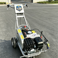 Machine de marquage routier par pulvérisation à froid avec soupape de décompression pour une utilisation sécurisée