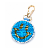 Llavero de Cuentas con Cara Sonriente Hecho a Mano Sstringz, Accesorio Creativo y Colorido para Bolsos de Moda, Mochilas de Viaje y Regalos