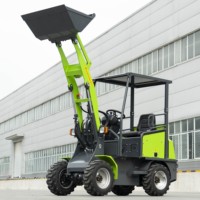 Chargeuse sur pneus électrique compacte verte avec godet hydraulique 4x4 pour jardin et ferme