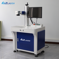 Machine de marquage laser UV économique et facile à utiliser pour la gravure personnalisée de cadeaux, de cuir et de bois.