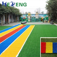Terrain de jeux coloré arc-en-ciel herbe tapis vert rouge bleu violet jaune artificiel synthétique pelouse gazon basket-ball Football