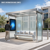 Abri de bus en acier galvanisé prêt à être expédié, design moderne avec écran d'information numérique pour les projets de transport public.