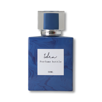 Emballage de bouteille de parfum Boîte d'emballage de parfum bleu carré avec logo personnalisé Bouteille de 30ml 50ml Bouteille en verre noir pour un travail normal
