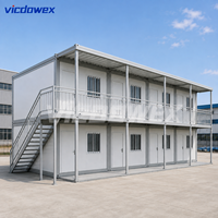 VICDOWEX Maison Conteneur Modulaire Contemporaine Préfabriquée en Panneaux Sandwich en Acier pour Entrepôt, Camp ou Bureau