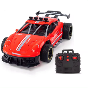 Voiture de course télécommandée 4x4 2,4 GHz 1:16 à grande vitesse avec fonction de pulvérisation, lumières et fumée - Product Image 1