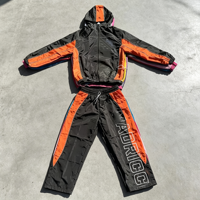 Ensemble survêtement streetwear en nylon patchwork personnalisé avec lignes réfléchissantes, coupe-vent, veste zippée et pantalon pour homme – Vente en gros
