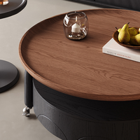Table de cocktail ronde noire contemporaine avec roulettes pour hôtel et salon