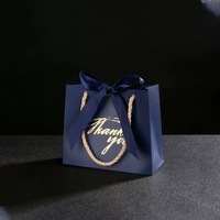 Sacs Cadeaux de Noël en Papier de Luxe en Gros avec Poignée Personnalisés Impression Offset Logo pour Bougies
