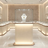 Vitrine à bijoux sur pied personnalisée, haute, en verre, avec éclairage LED, pour boutique de bijoux de luxe