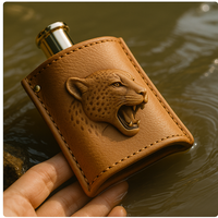 Bouteille de parfum de luxe pour hommes et femmes conteneur en cuir rechargeable en relief avec capuchon en or emballage cadeau de surface sérigraphiée