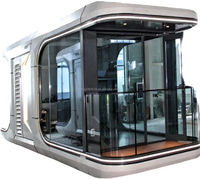 Conteneur extérieur moderne en panneaux sandwich d'acier, type capsule spatiale, pour entrepôt Apple Star Room