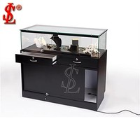 Vitrine de luxe en verre trempé pour bijoux avec socle noir mat, présentoir de comptoir et cadre métallique fin