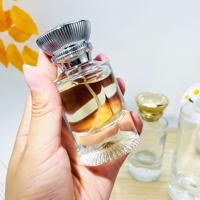 Flacon de parfum en verre cylindrique transparent de haute qualité 30ml 50ml 100ml avec pompe pulvérisatrice et diffuseur à bâtonnets, personnalisable