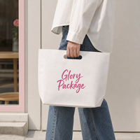 Sacs shopping personnalisés en papier kraft blanc durable avec poignées découpées et impression de logo pour l'emballage de vêtements, chaussures et boutiques de détail